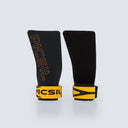 Calleras Golden con magnesio color negro y amarillo de frente y de reverso