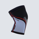 Vista trasera de las rodillera Hex Tech azul mostrando su diseño anatómico y costuras reforzadas.