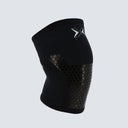 Una rodillera negra modelo Hex Tech de frente.